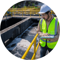 person wearing safety vest and hat